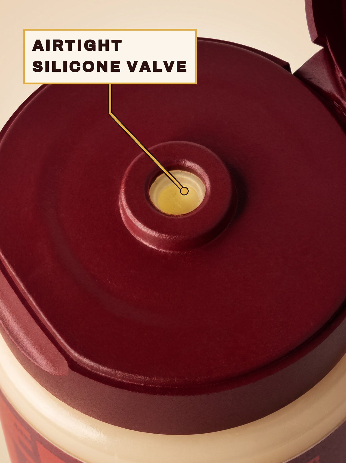 Flip-top cap open with a callout pointing to the airtight silicone valve