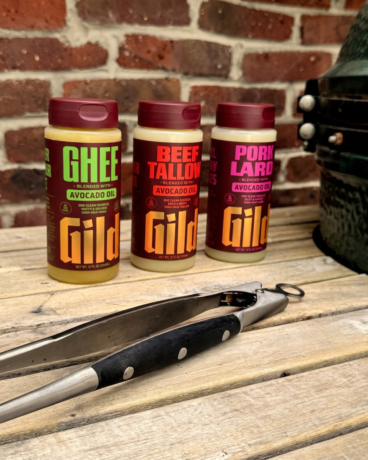 The GILD lineup out at the grill, tongs at hand