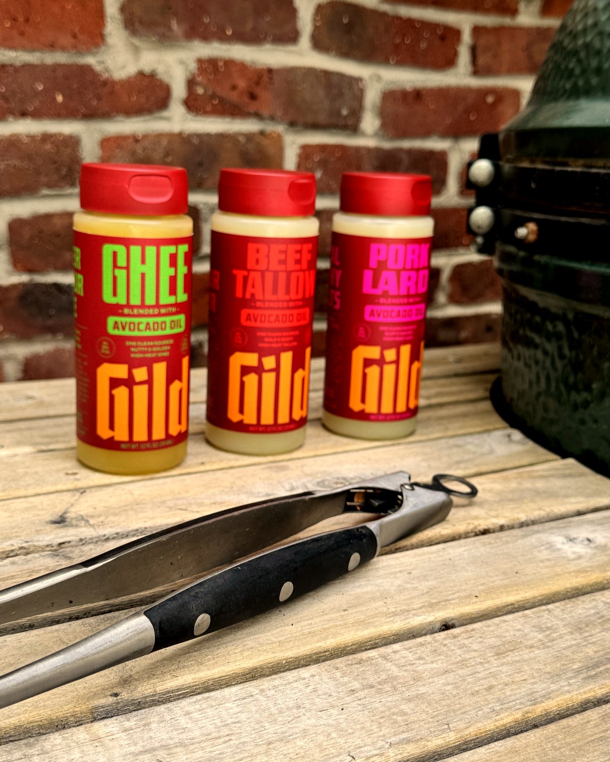 The GILD lineup out at the grill, tongs at hand